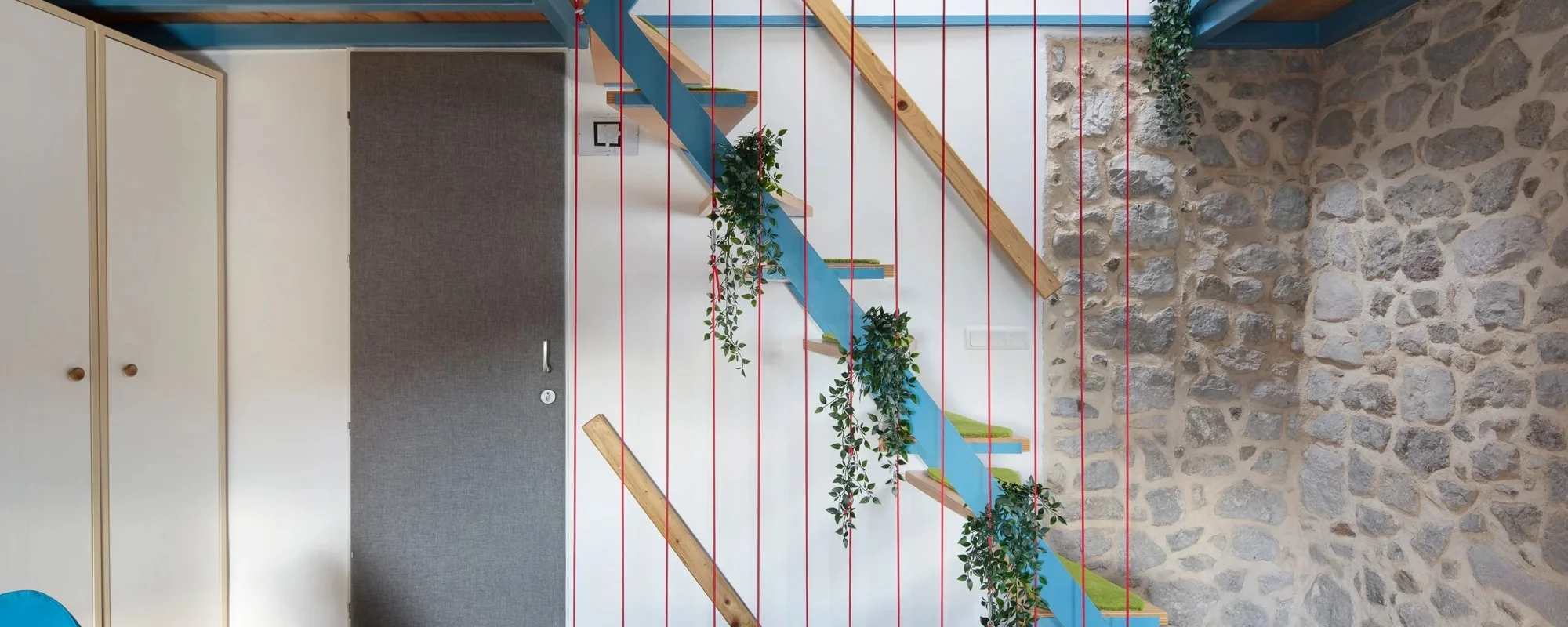 Kuća H – rekonstrukcija stare kamene kuće u dva tripleks studija na Krku